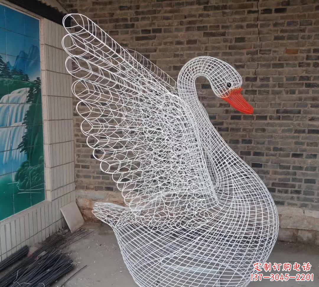 哈尔滨不锈钢制天鹅雕塑象征着和谐与美好
