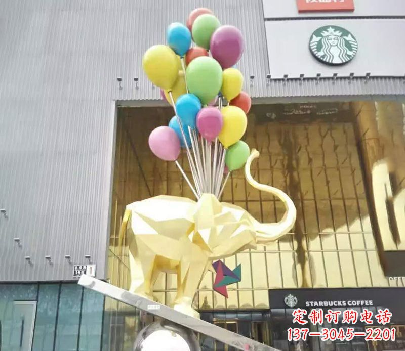 哈尔滨不锈钢踩球的小象雕塑