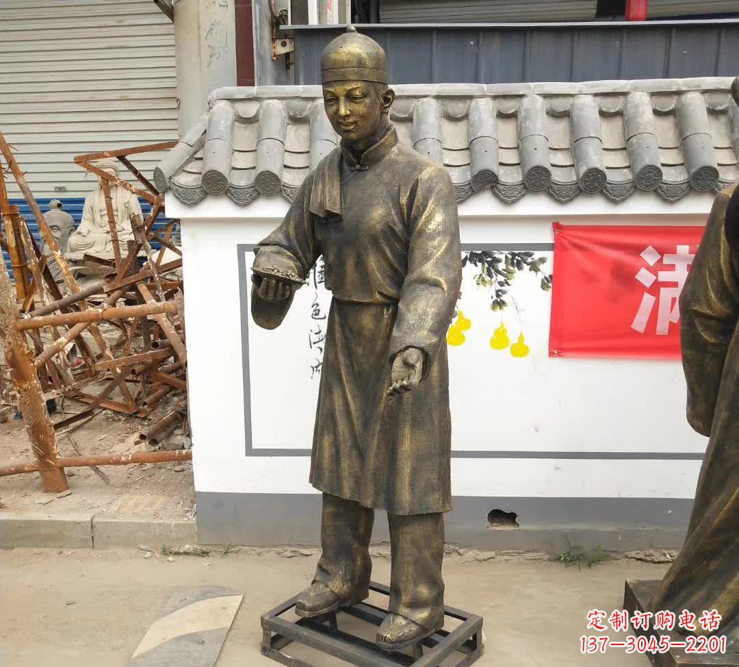 哈尔滨传承百年店小二铜雕