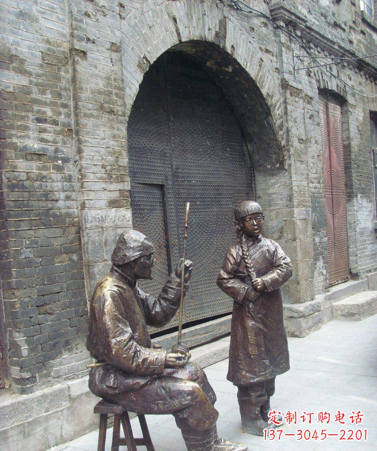 哈尔滨步行街拉二胡唱戏人物铜雕