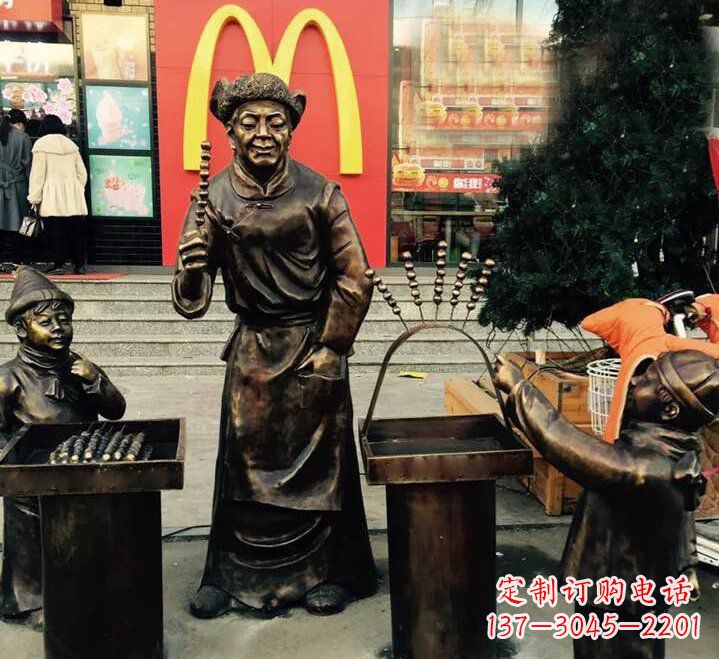 哈尔滨步行街卖糖葫芦的人物铜雕