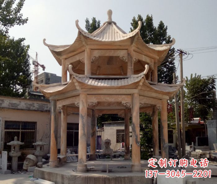 哈尔滨公园景观晚霞红双层石雕凉亭