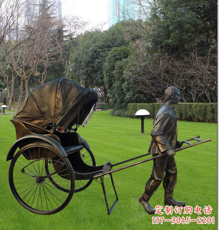 哈尔滨公园拉黄包车的人物铜雕