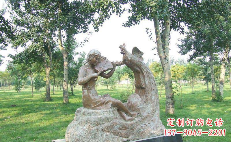 哈尔滨公园拉小提琴的女孩和凤凰景观铜雕
