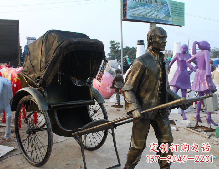哈尔滨公园拉着黄包车的人物小品铜雕