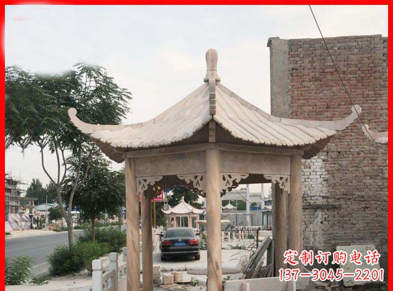 哈尔滨公园晚霞红六角石凉亭雕塑