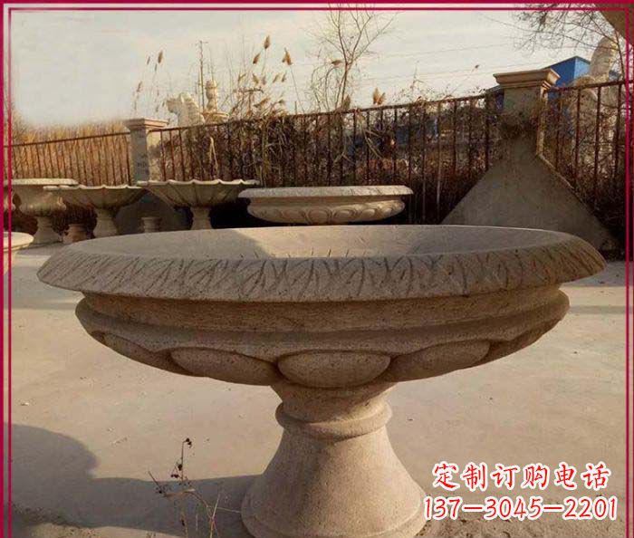 哈尔滨黄锈石花盆雕塑,让花园更加美丽