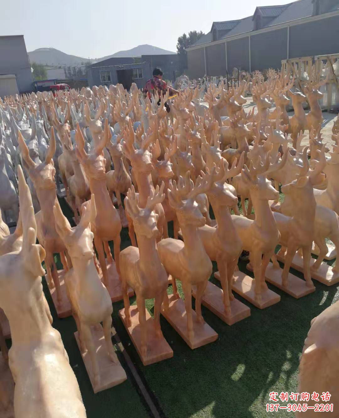 哈尔滨石雕动物晚霞红梅花鹿雕塑