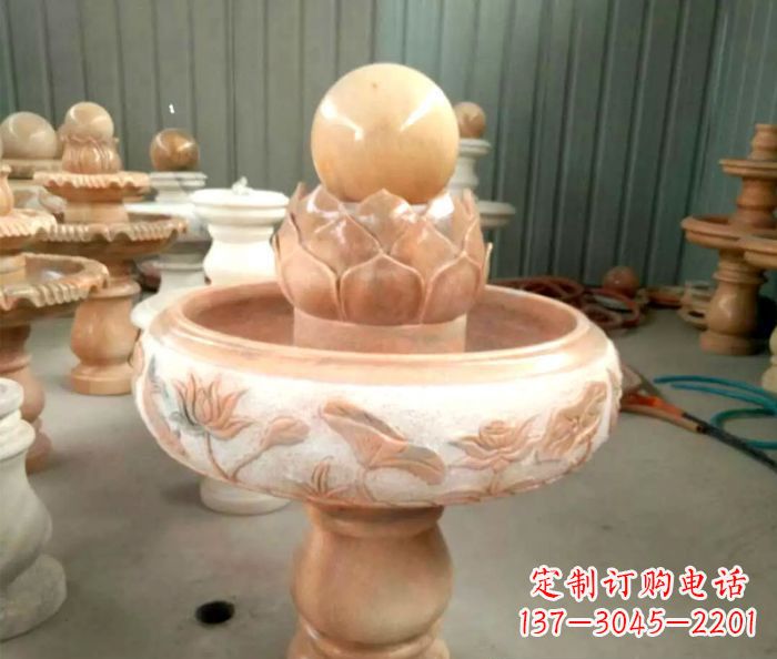 哈尔滨石来运转晚霞红风水球喷泉石雕