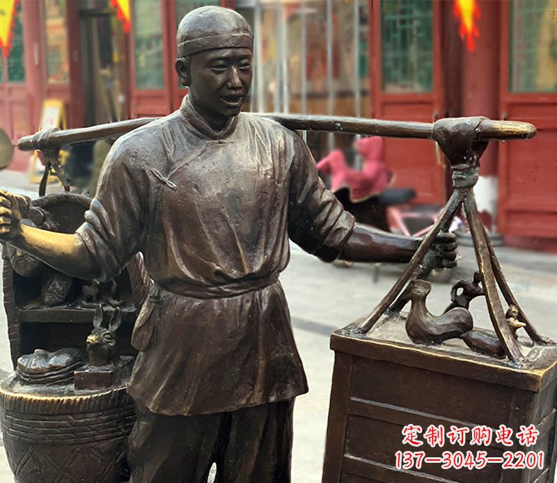 哈尔滨铜雕步行街卖货郎人物雕塑