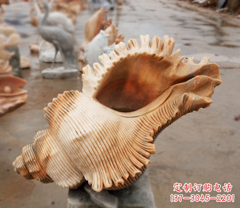 哈尔滨晚霞红海螺石雕广场景观雕塑