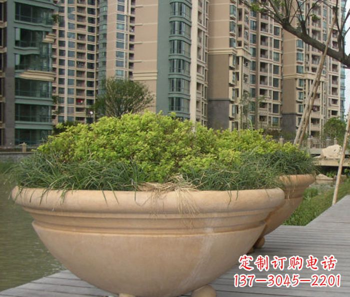 哈尔滨小区景观晚霞红花盆石雕